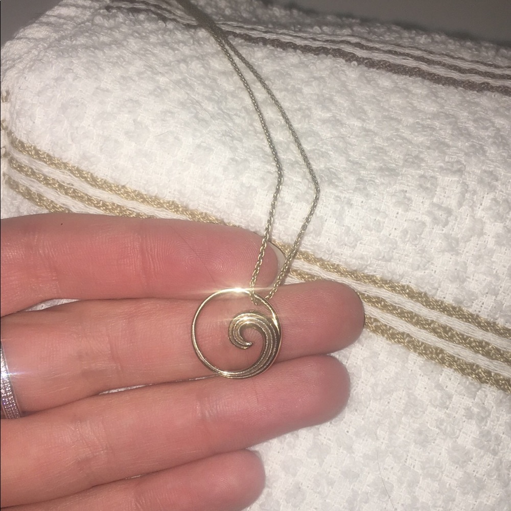 Gold wave pendant